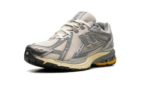 New Balance 1906R "Metallic Silver Yellow"